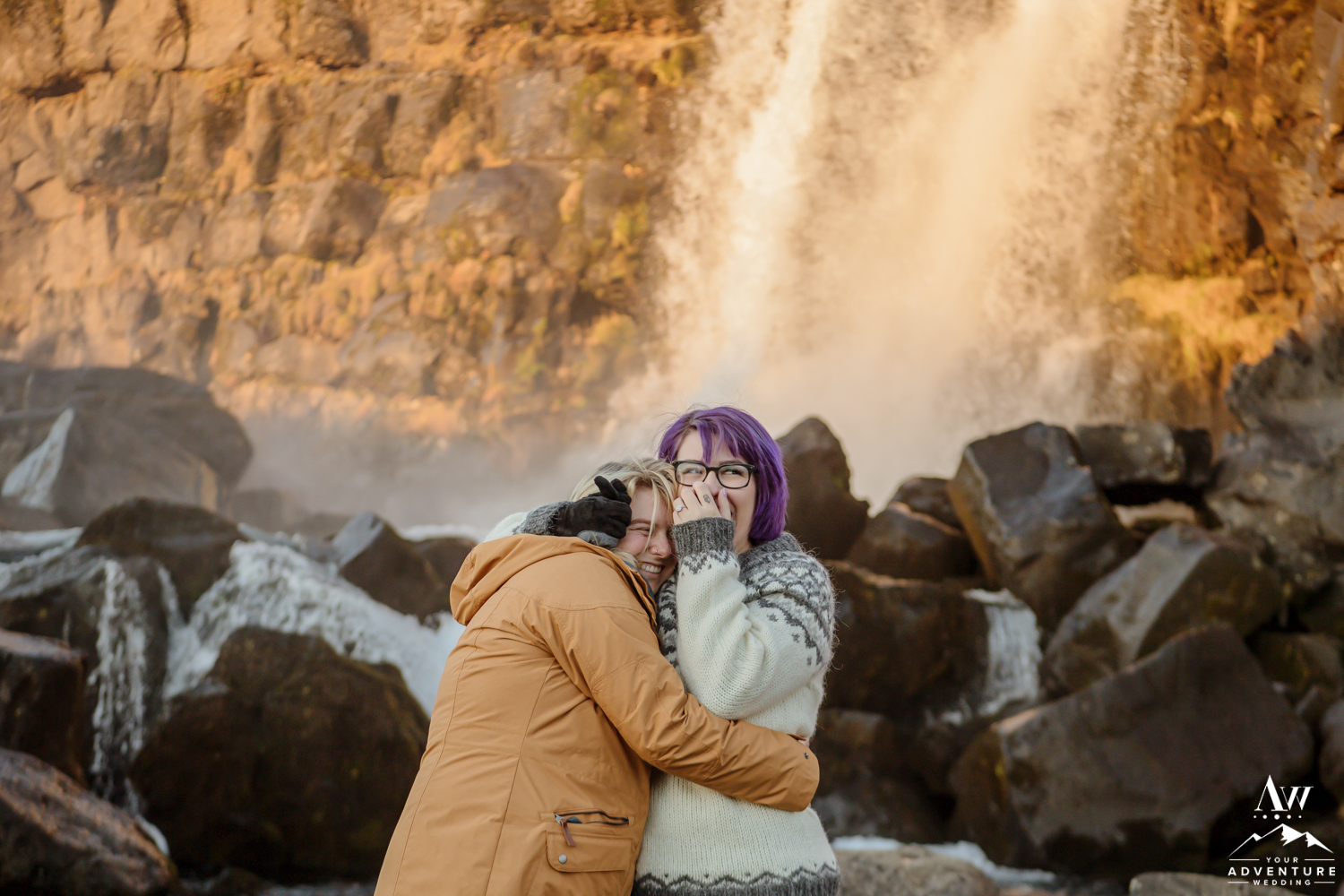 Iceland Surprise Proposal at Sunrise in front of a waterfall