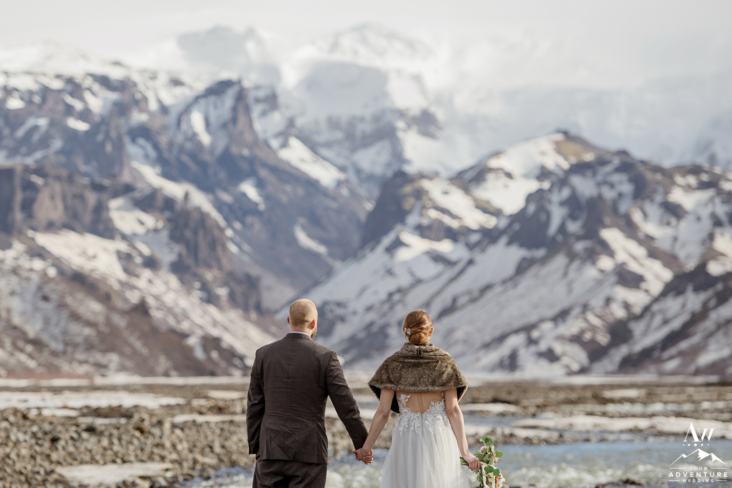 Iceland Adventure Elopement Couple looking at mountains