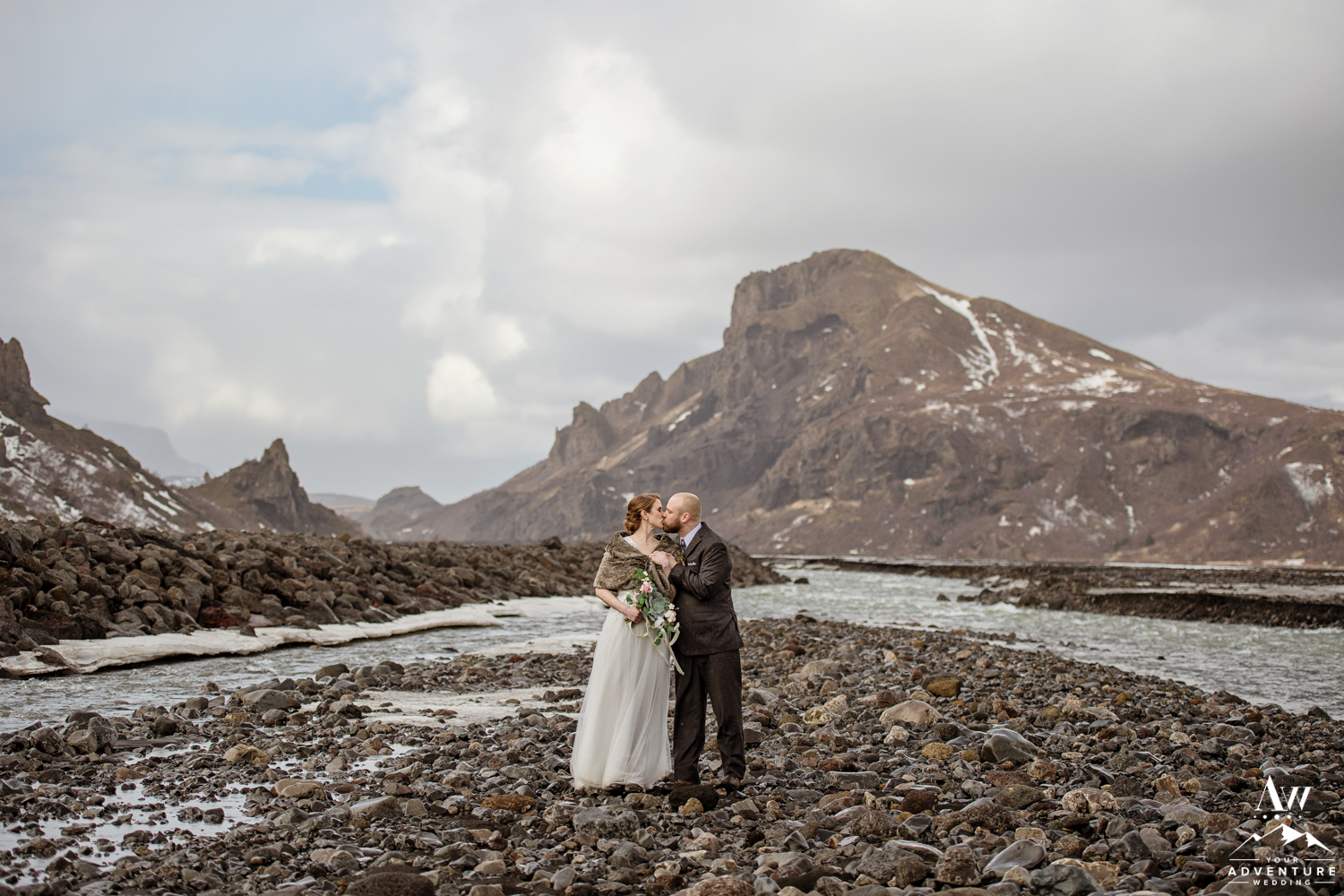 Couple kissing during Iceland elopement adventure