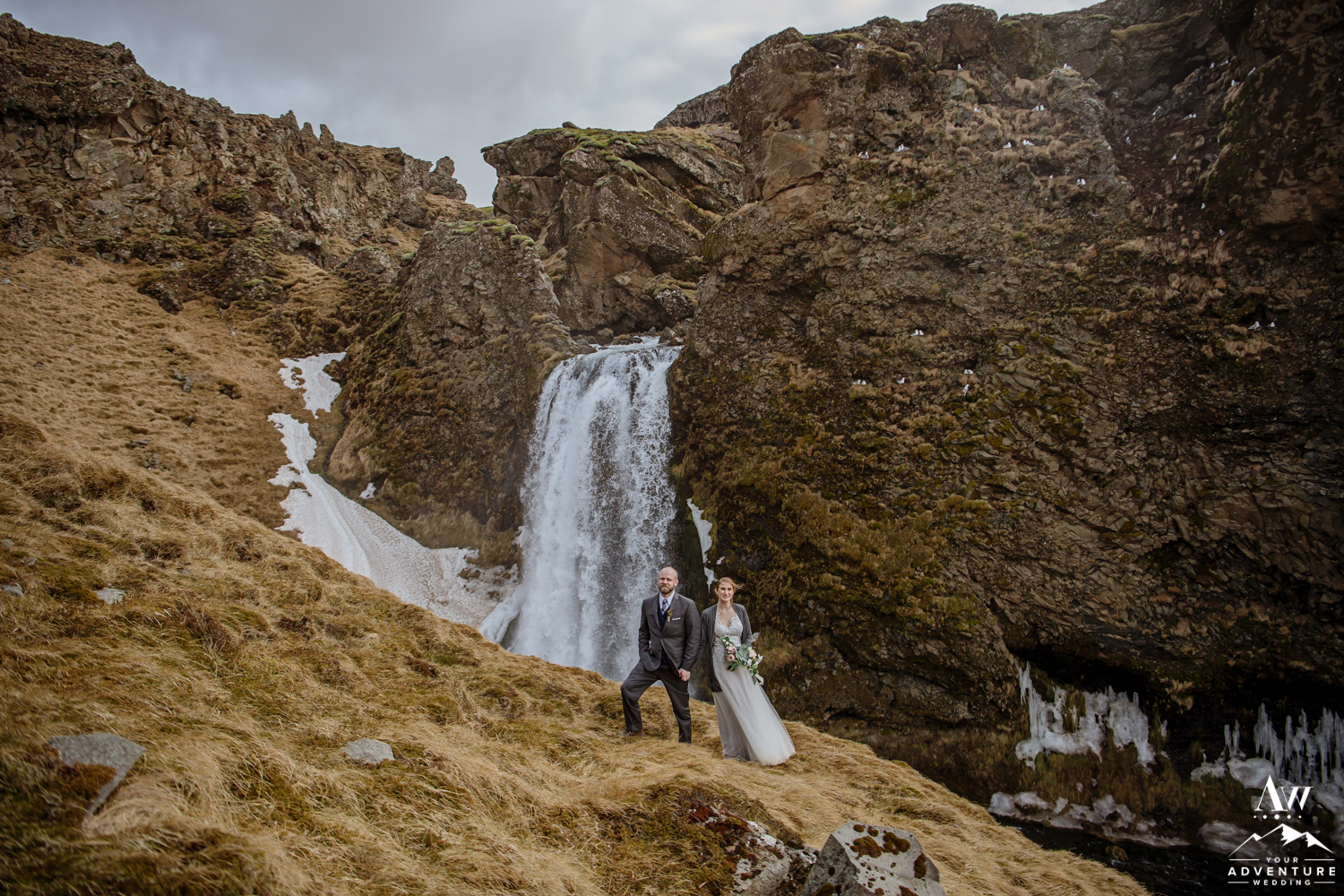 Iceland Elopement Wedding Photo in front of a waterfall