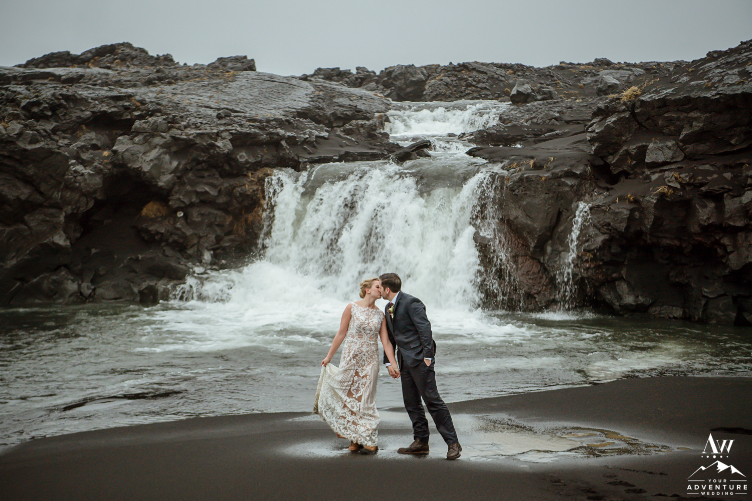 Couple Kissing in front of a waterfall in Iceland