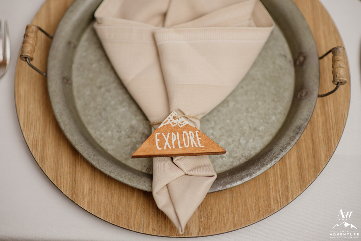 Explore Napkin Ring on top of charger plats