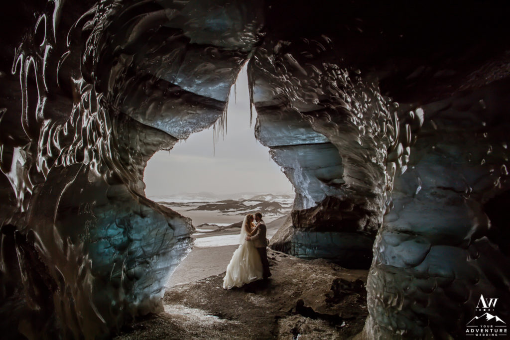 Bride and Groom inside of Ice Cave