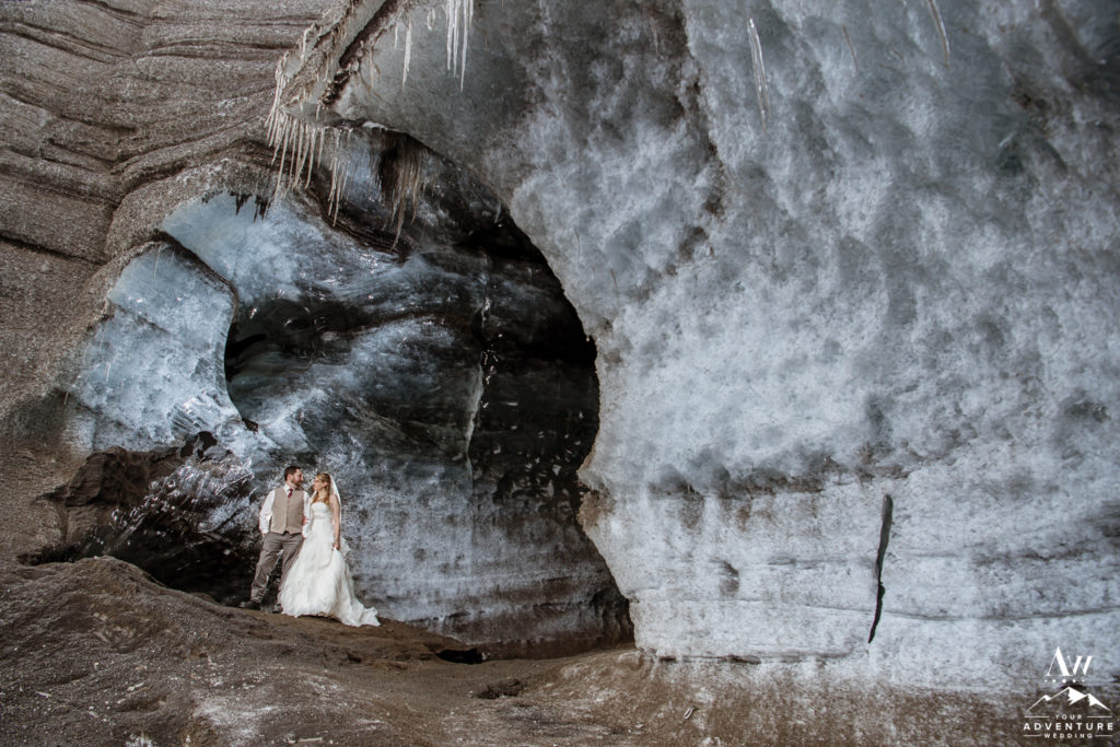 Iceland Elopement Couple exploring an ice cave