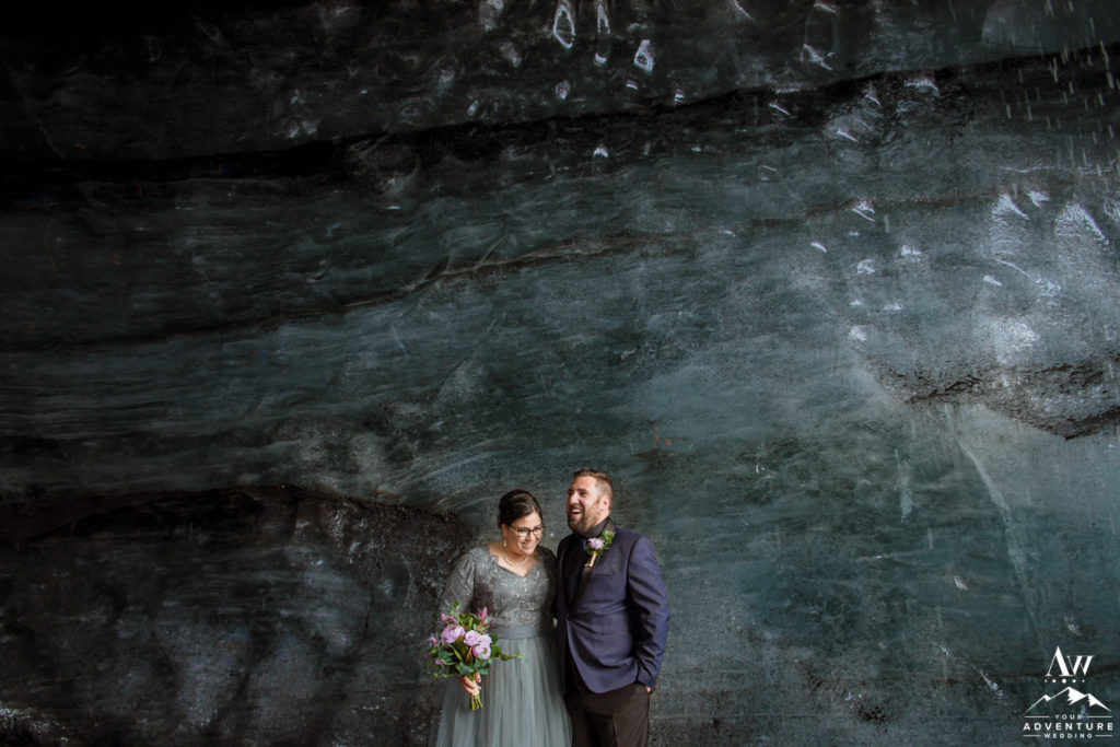 Iceland Wedding Couple laughing in an ice cave