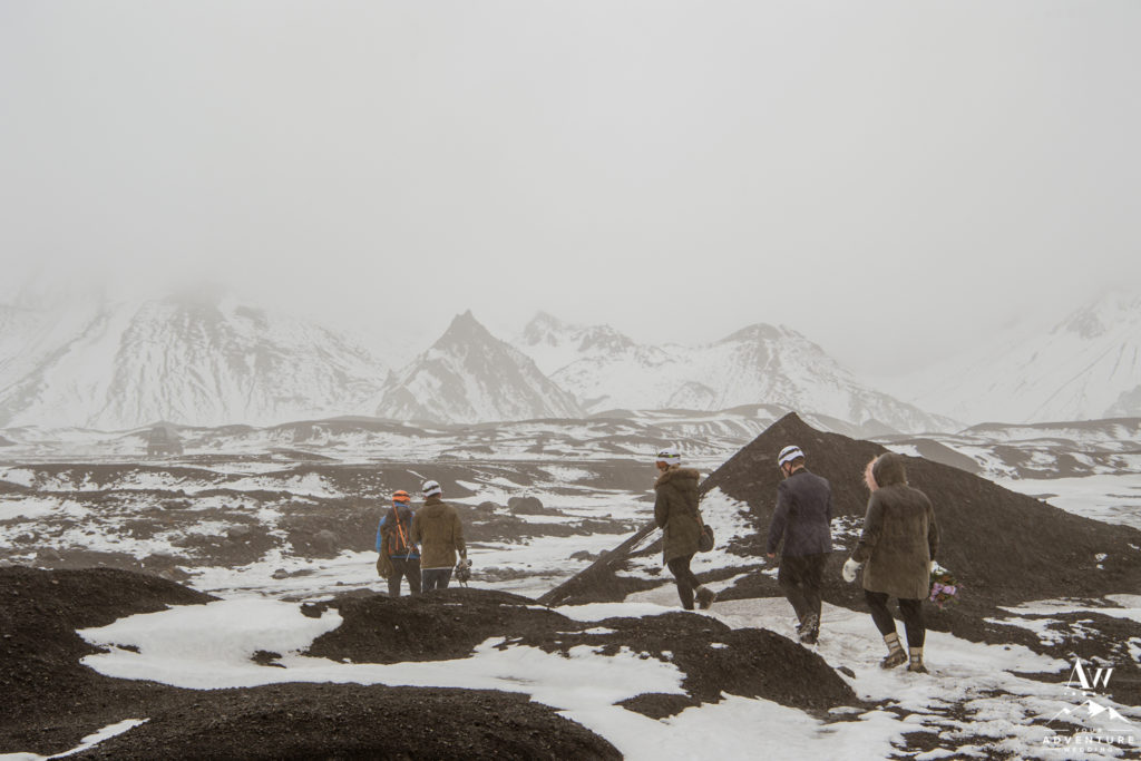 Iceland Wedding Vendors hiking out of a glacier area