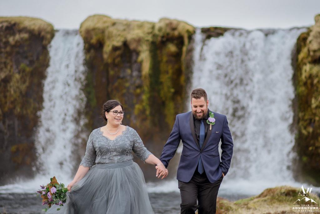 Couple at private waterfall in Iceland