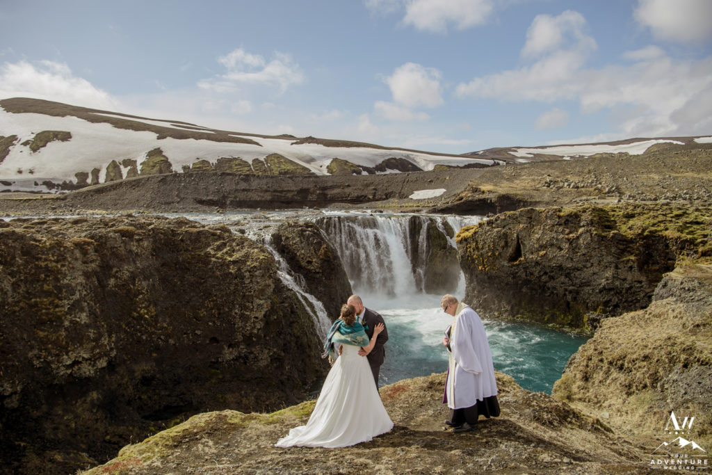 Couple kissing after Iceland wedding ceremony