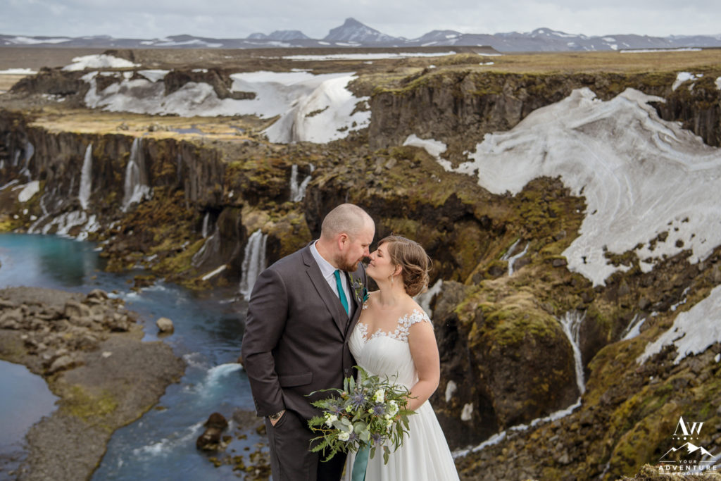 Iceland Wedding Couple Looking at each other in front of a canyon