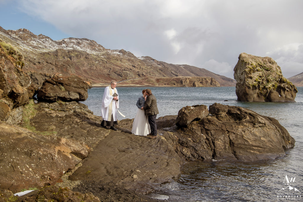 Iceland Wedding couple kissing during ceremony