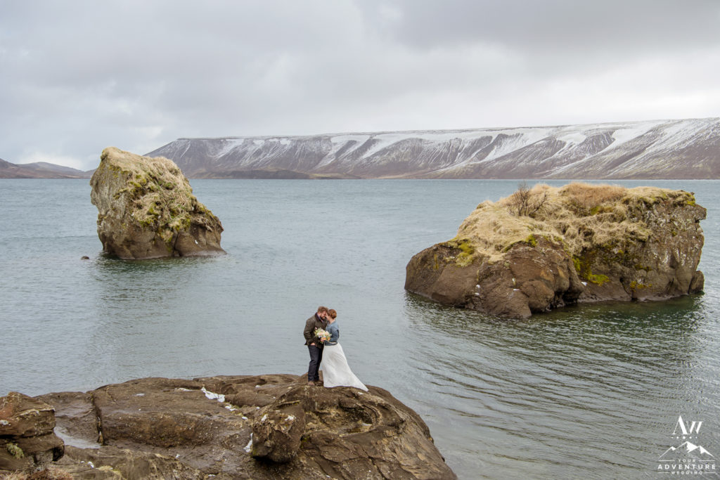 Iceland Elopement Couple kissing on a rock