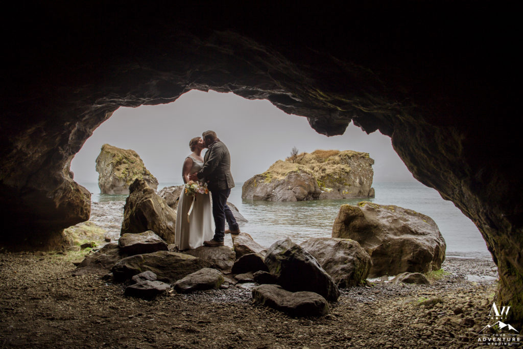 Iceland Wedding Couple kissing in a cave