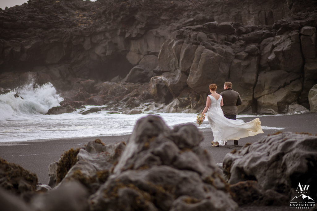 Iceland Wedding Couple Walking on a black beach
