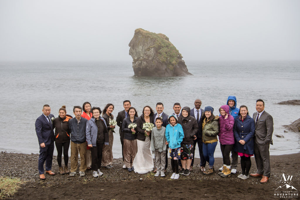 Group photo after Iceland wedding ceremony at a lake