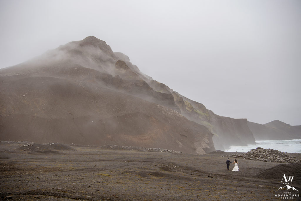 Iceland Wedding Couple Walking to Sea Cliffs
