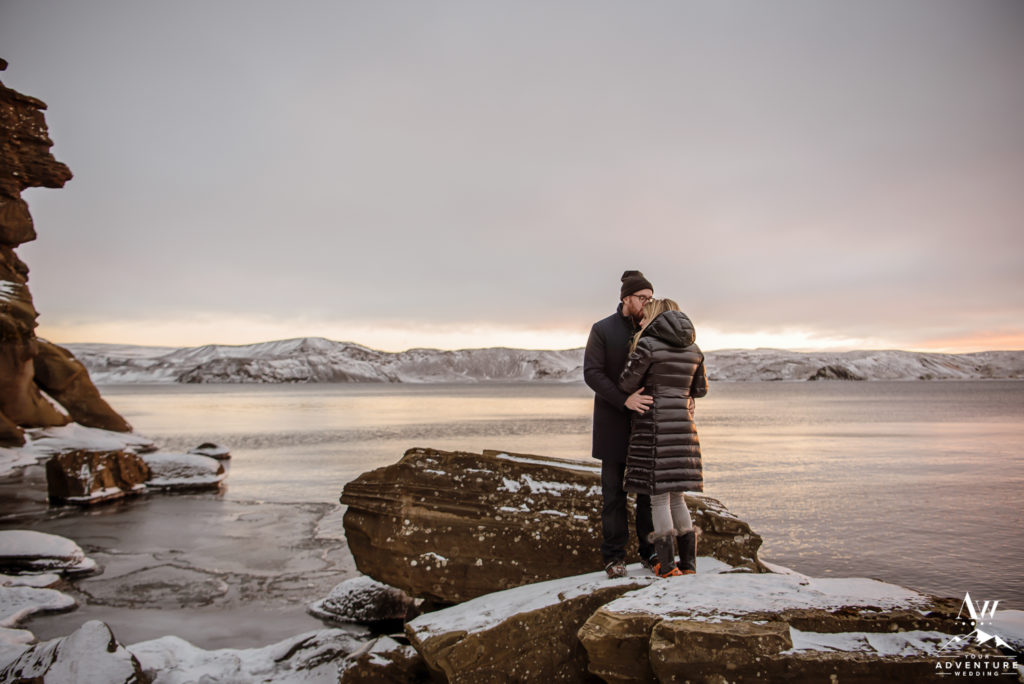 Iceland Engagement Couple at sunset on a lake