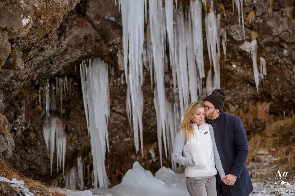 Iceland Winter Engagement Session with icicles