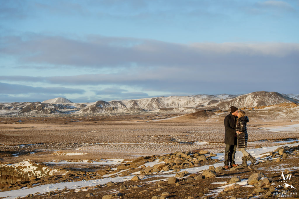 Winter Iceland Engagement Session on golden cliffs