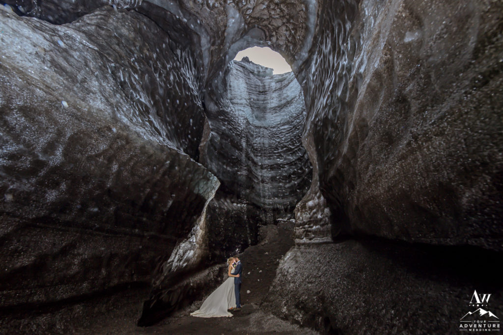 Adventure Wedding Couple inside of an ice cave in Iceland
