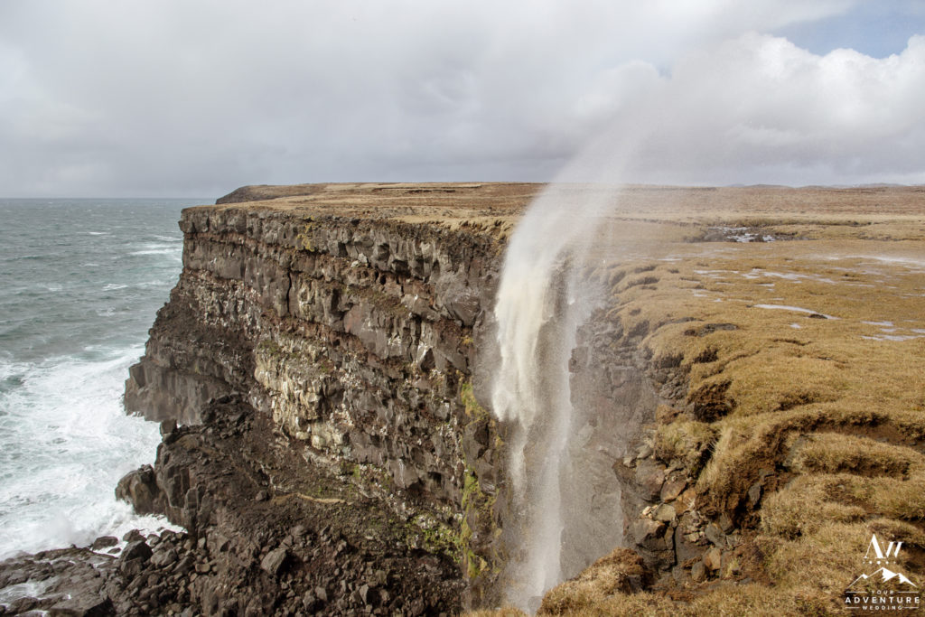 Waterfall running upside down in Iceland