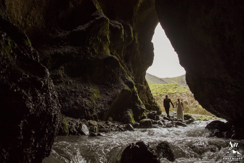 River Cave in Iceland Couple Exploring
