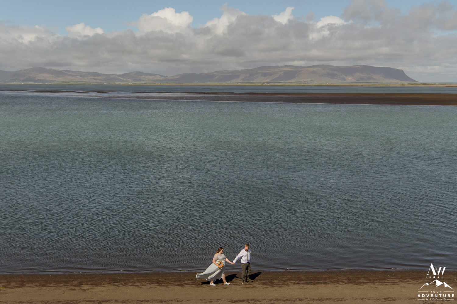 Iceland Wedding Couple Exploring Black Beach