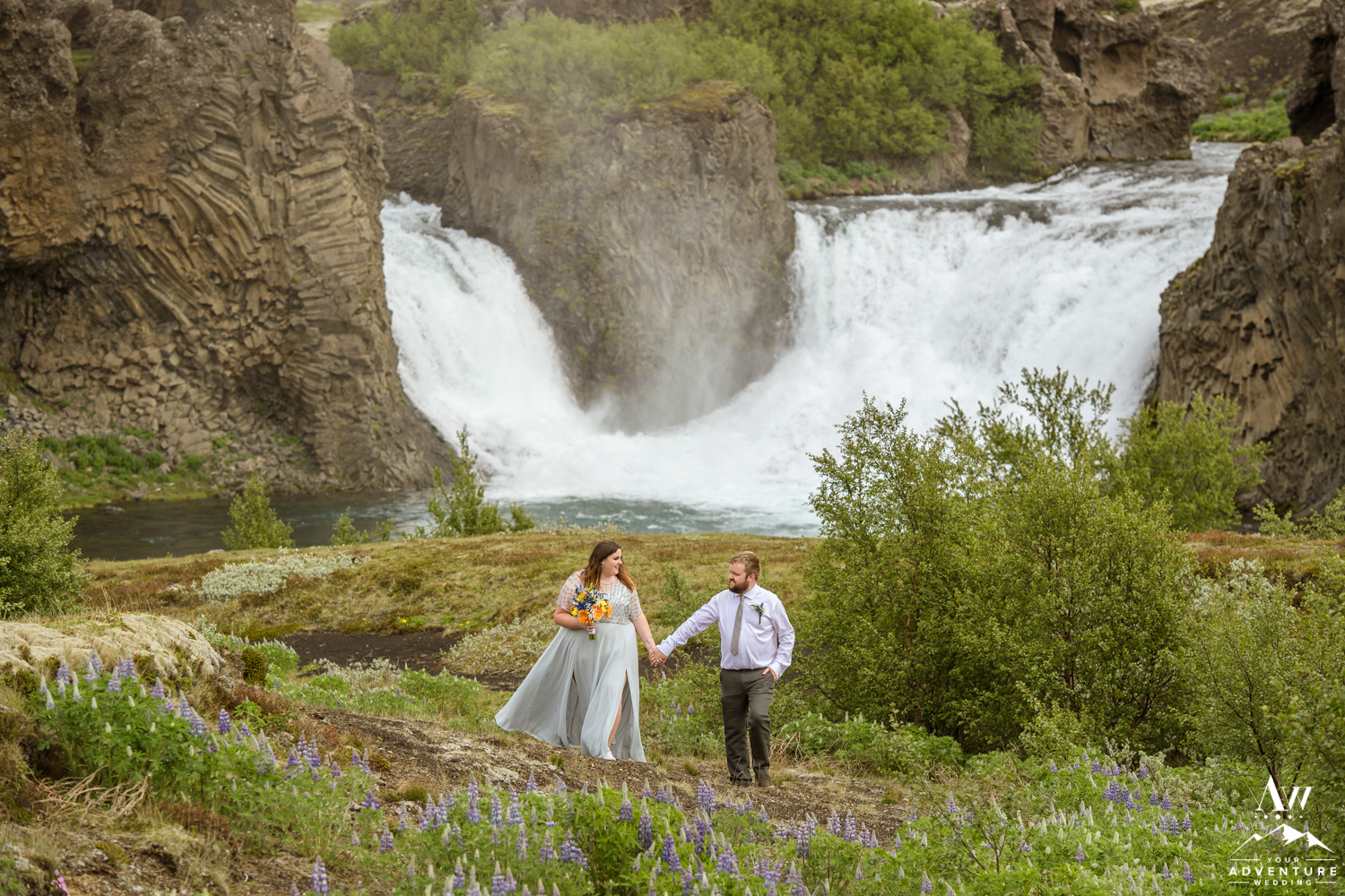 Adventure wedding in Iceland at Hjalparfoss Waterfall