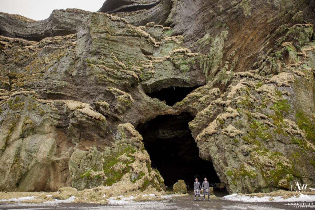 Gay Couple outside of a cave in Iceland