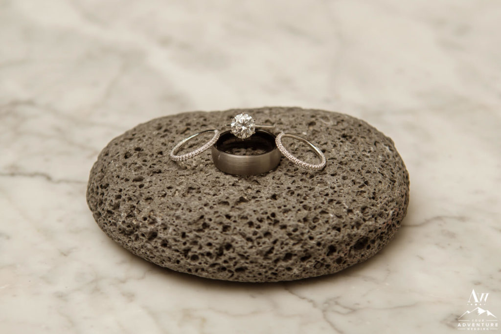 Iceland wedding rings on basalt rock