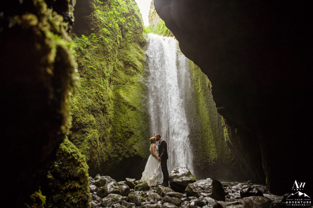 Iceland Elopement Couple kissing at Nauthúsagil Waterfall