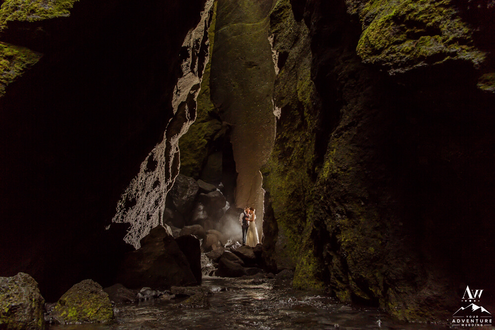 Hiking Elopement Couple inside Stakkholtsgjá Slot Canyon