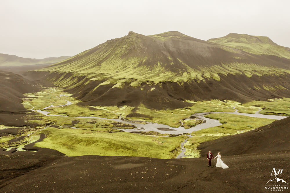 Sizzling Summer Iceland Wedding Adventure Couple in Vivid Green Canyon