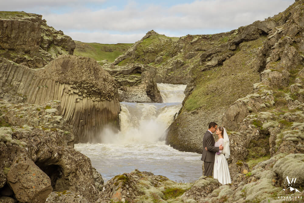 Iceland Elopement Photos at a waterfall