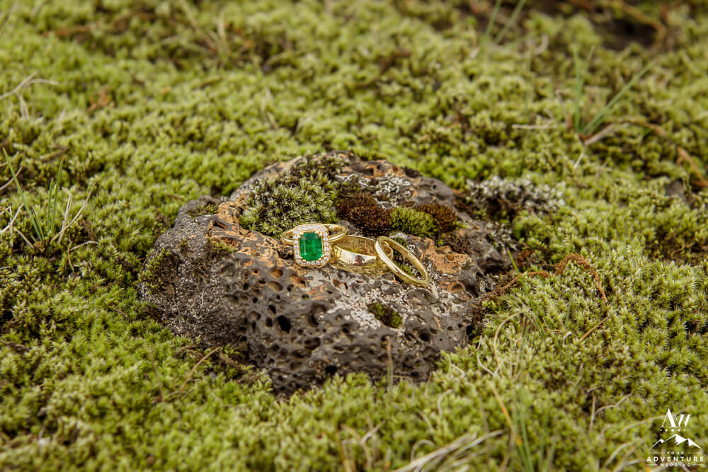 Iceland wedding rings on lava rocks and moss