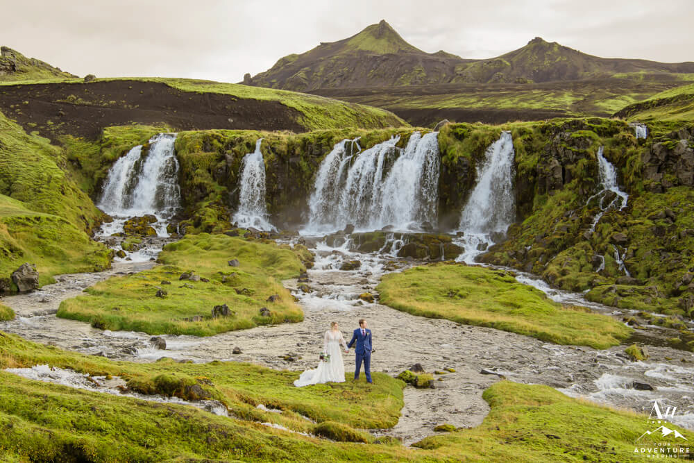 Iceland Autumn Wedding Couple at a waterfall