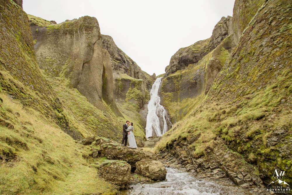 Iceland Remote Elopement Couple at Waterfall