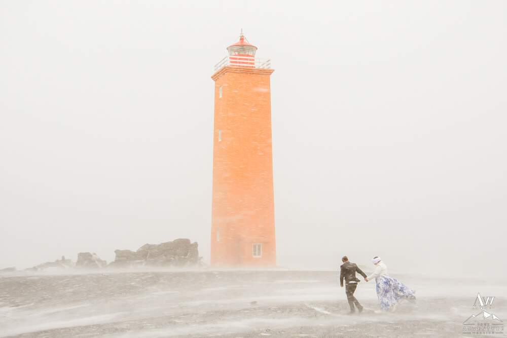 Blizzard Vow Renewal Couple at Lighthouse during storm