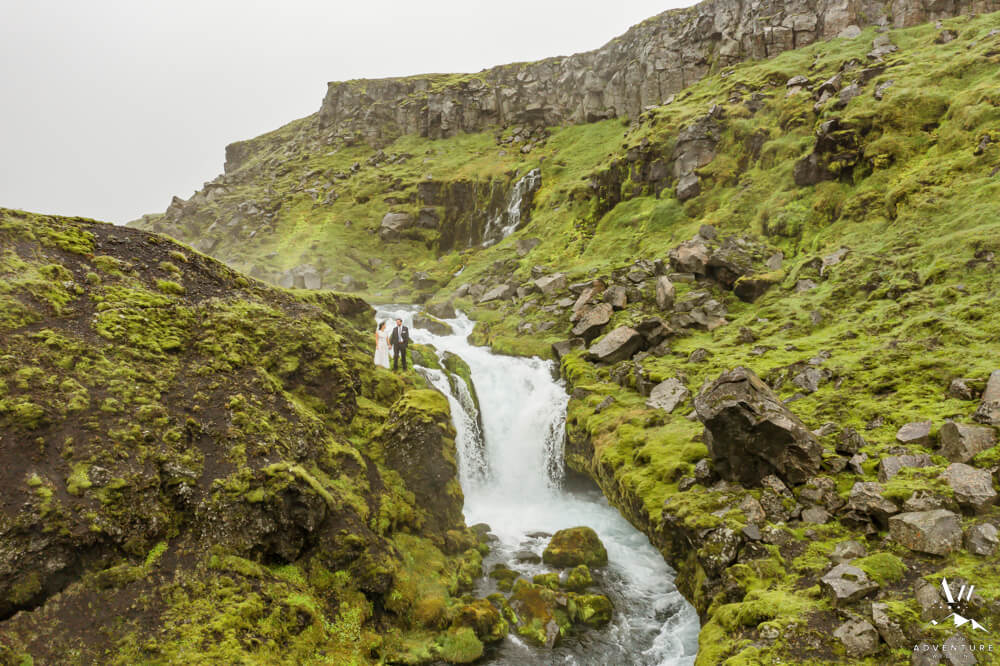 Rainy Day Elopement Photos at Iceland Waterfall