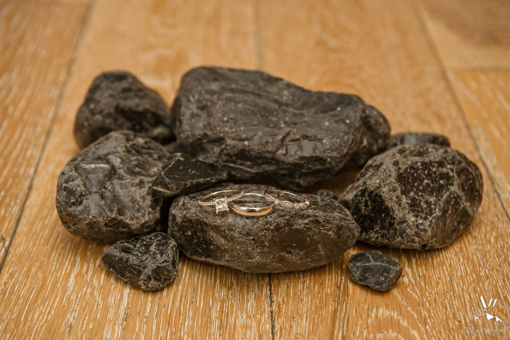 Iceland wedding rings on obsidian