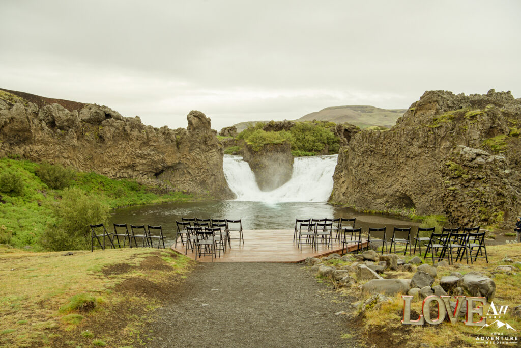 Ceremony setup at Hjalparfoss Waterfall