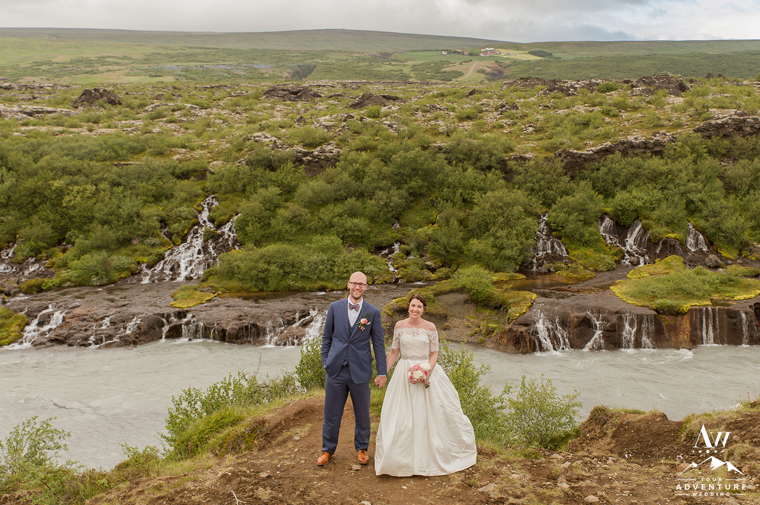 Icelandic Wedding - Couple at Hraunfossar Waterfall